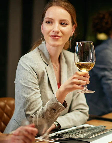 woman drinking a glass of wine in Bethesda, MD